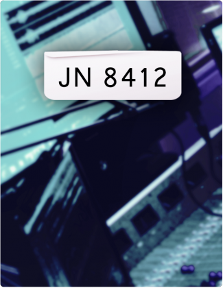 JN8412 written in black text, with the control room in the background.